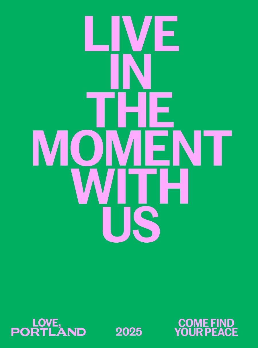 Green poster with large pink text reading "Live in the moment with us." Small white text at the bottom says "Love, Portland," "2025," and "Come find your peace.