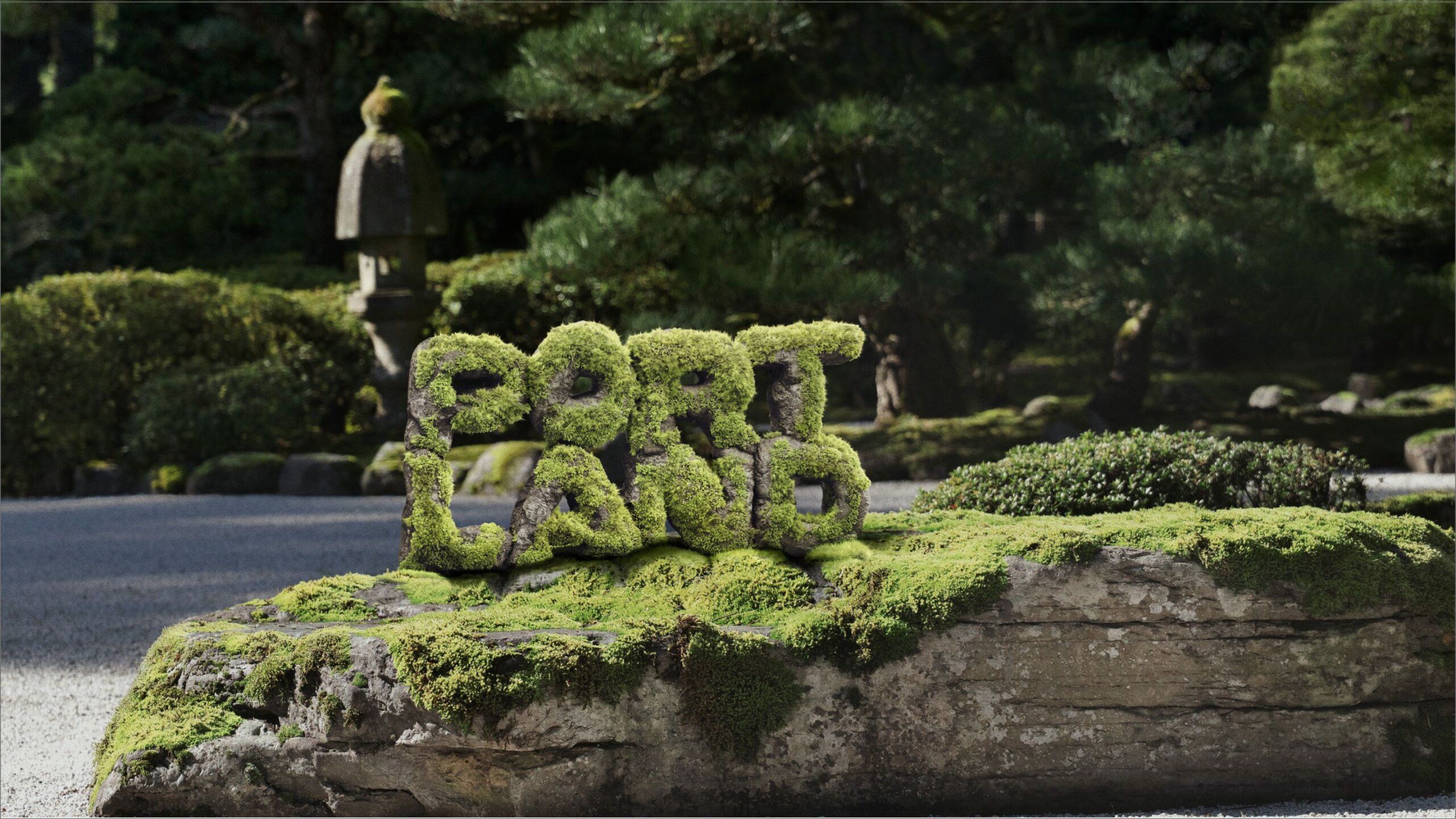 A moss-covered rock in a garden features the word "PORTLAND" sculpted from moss, with trees and shrubs in the background.