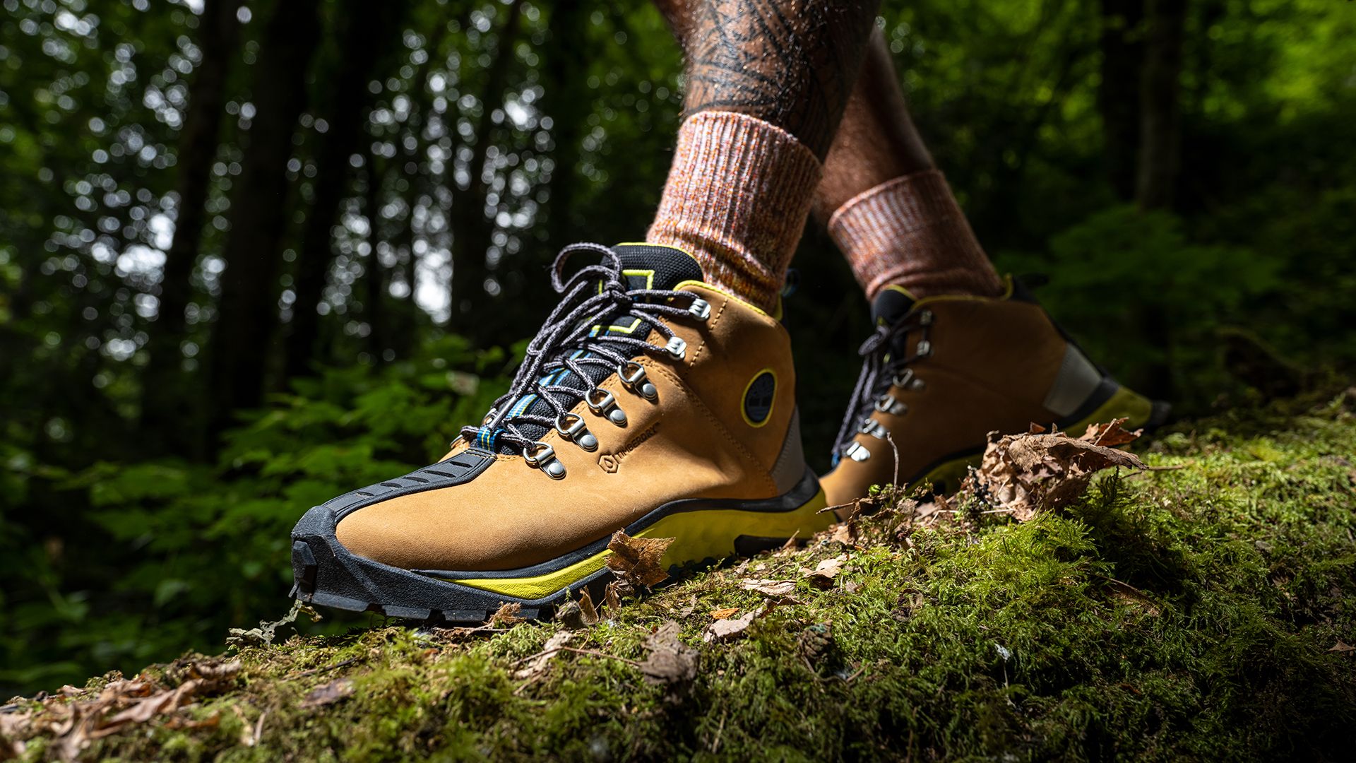 Hiking on trail, close up of Timberland Solar Ridge Greenstride boots