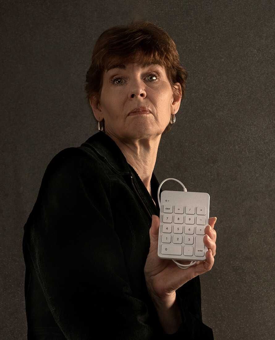 Donna Blocher holding calculator number pad