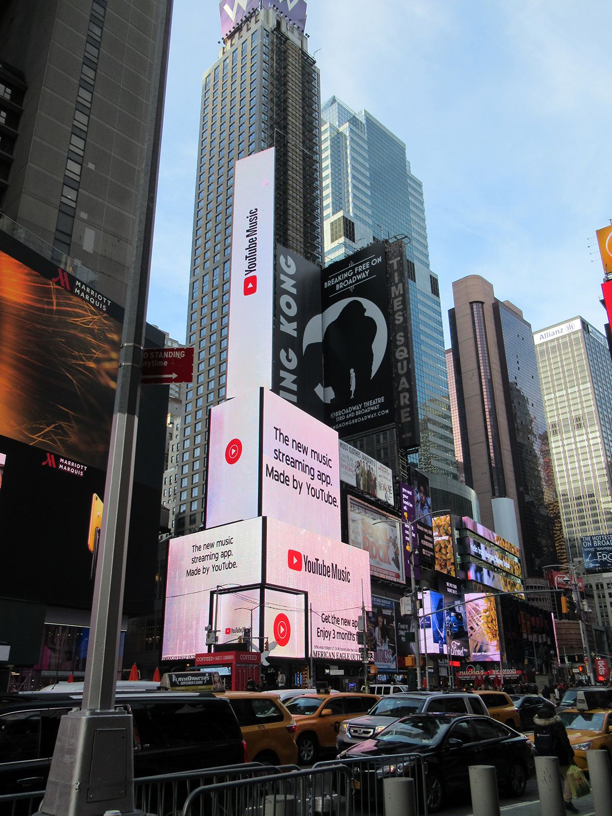 YouTube Music billboards covering corner of building in New York City. The new music steaming app. Made by YouTube