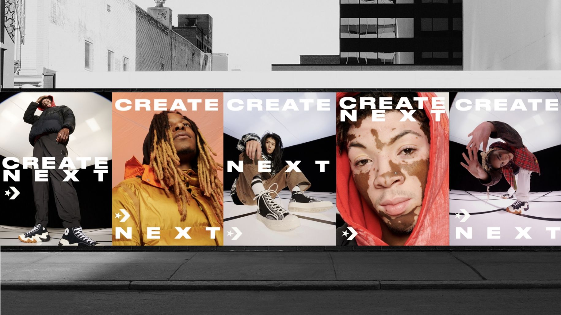 5 Create Next Posters rendered next to each other against black and white city wall. All Read Create Next with individuals standing, sitting or close up on face