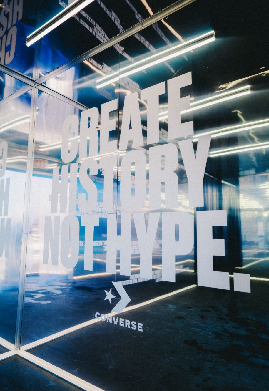 Mirror with type Create History Not Hype. Converse printed on it