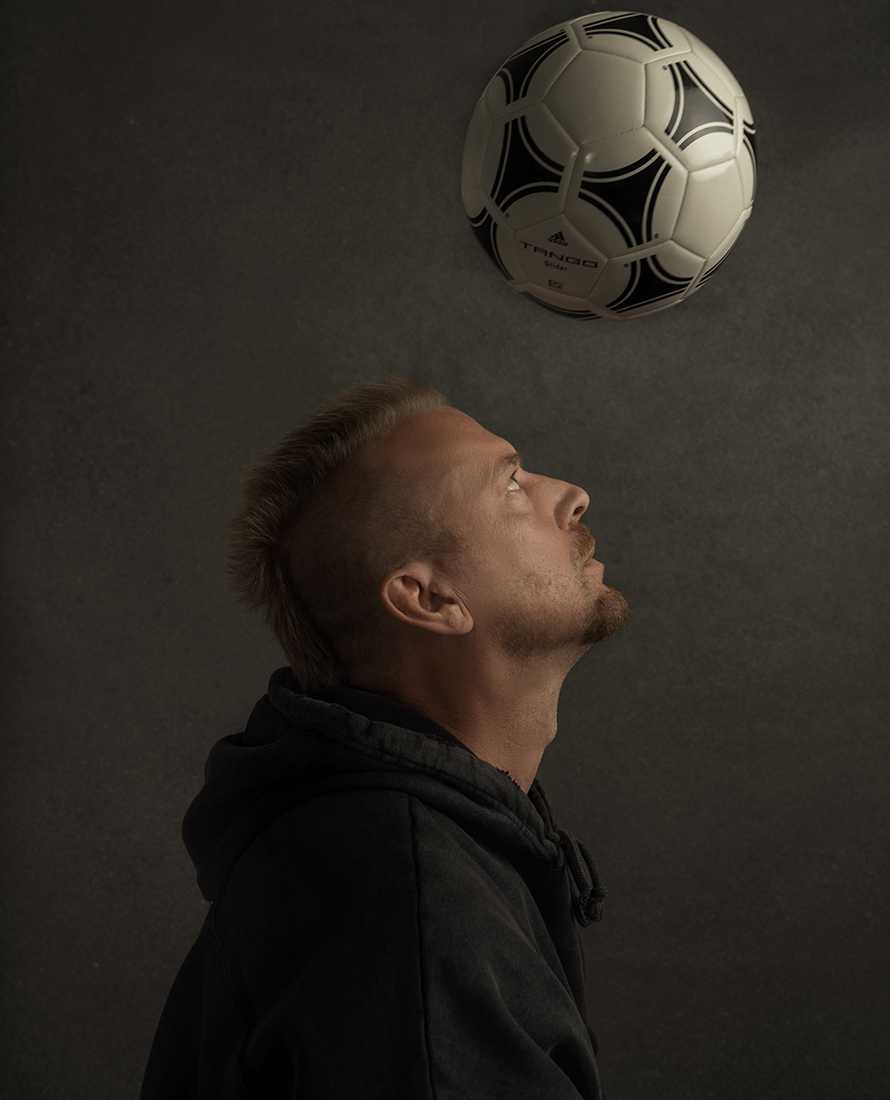 Jacy Weller profile with soccer ball above his head