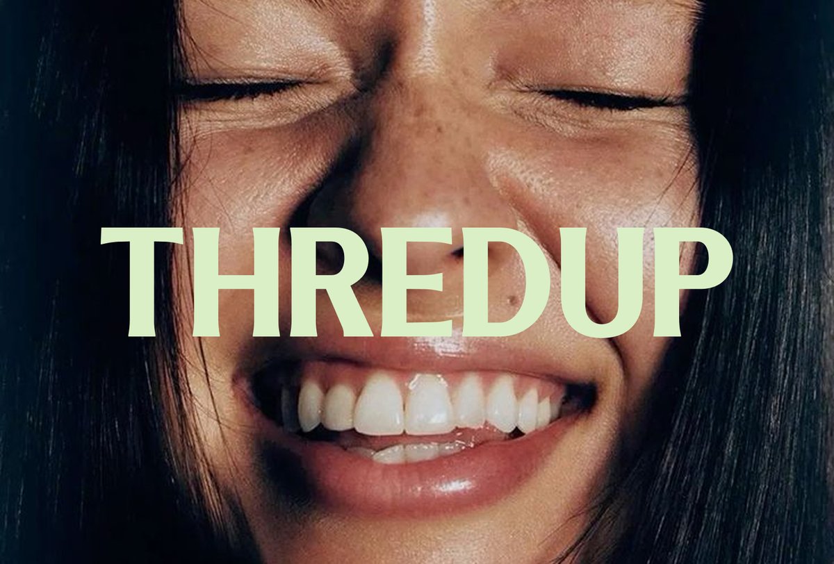 Close-up of a person smiling with their eyes closed, overlaid with large text that reads "THREDUP" in light yellow capital letters.