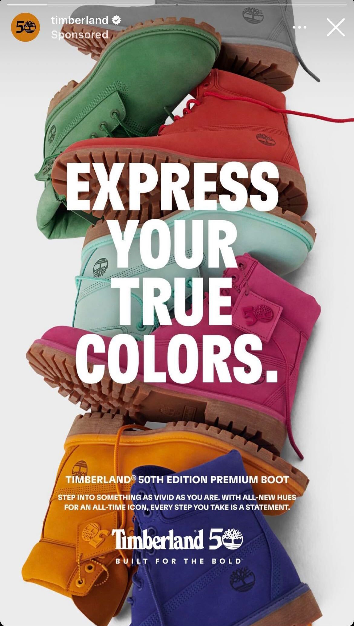 An ad for timberland boots with the words express your true colors.