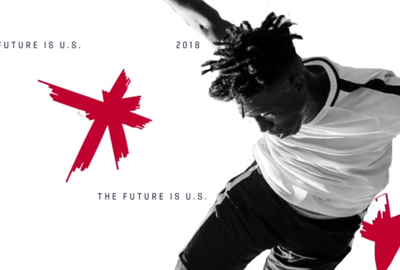 A soccer player in a white jersey and dark shorts is mid-action against a white background with red graphic elements and text reading "THE FUTURE IS U.S." and "2018.